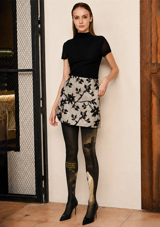Model wearing Black Christian Cross and Jesus Message Art Tights in a styled outfit
