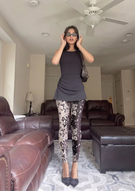 Model wearing Asymmetric Black and Ivory Rose Footless Tights in a styled outfit