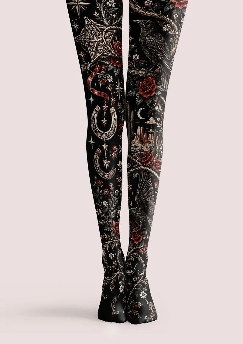 Black printed tights with red roses, ravens, stars, and botanical decorative motifs
