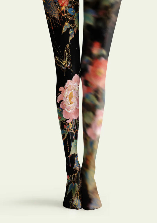 Black printed tights with one clear floral leg and one blurred floral leg