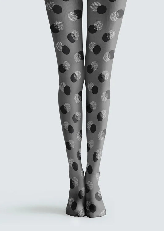 Gray printed tights with overlapping black and white polka dots in solid and dotted circular designs