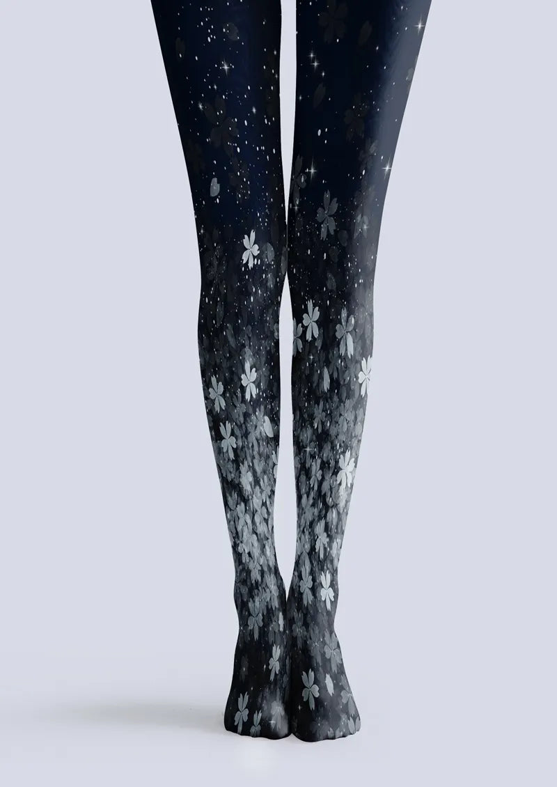 Navy printed tights with gray and white flowers and scattered star-like speckles