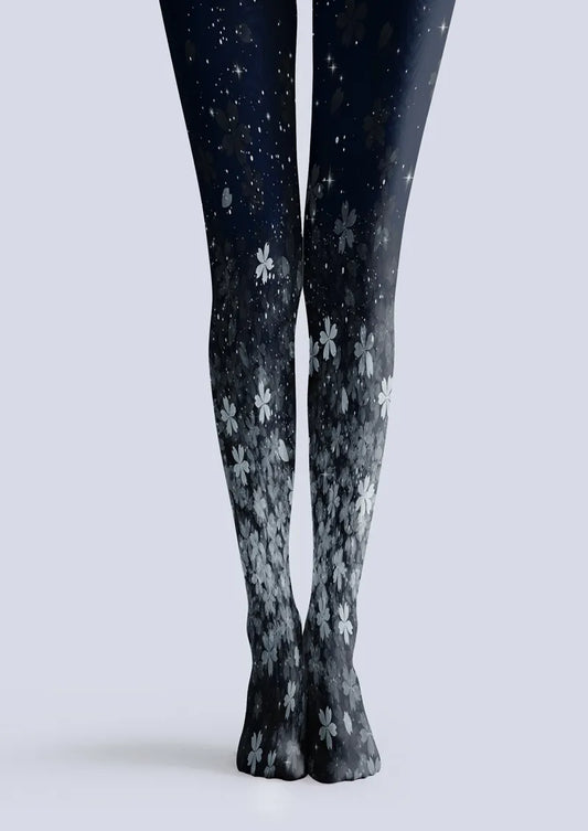 Navy printed tights with gray and white flowers and scattered star-like speckles