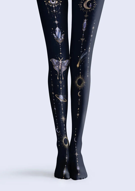 Blue printed tights with celestial moon, crystal, and star motifs