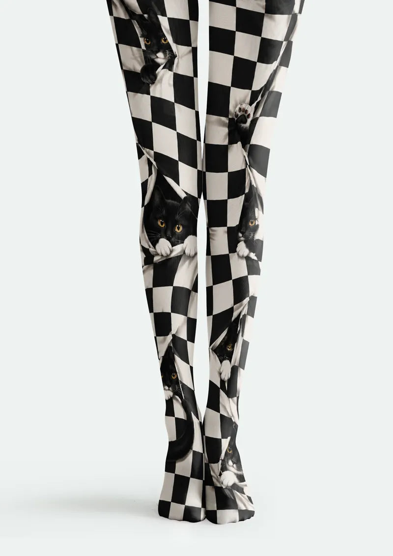 Black and white printed tights with checkerboard pattern and playful black cat portraits