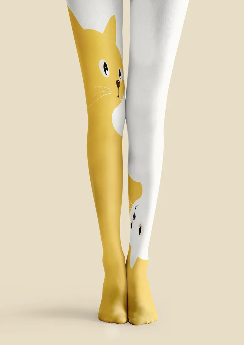White and yellow printed tights with a split cat design, featuring one large yellow cat and one smaller white cat