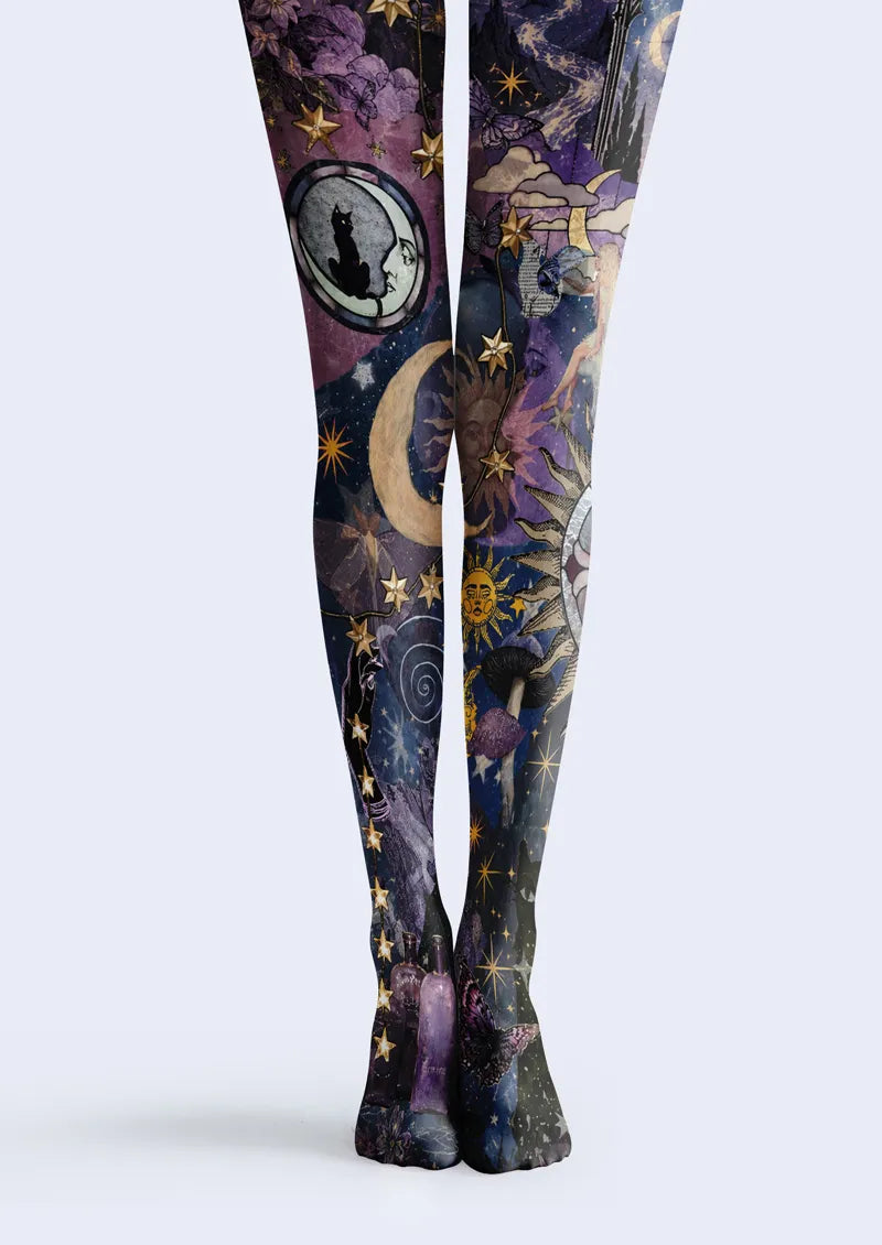 Purple printed tights with moon, stars, black cat, mushrooms, flowers, and celestial collage details