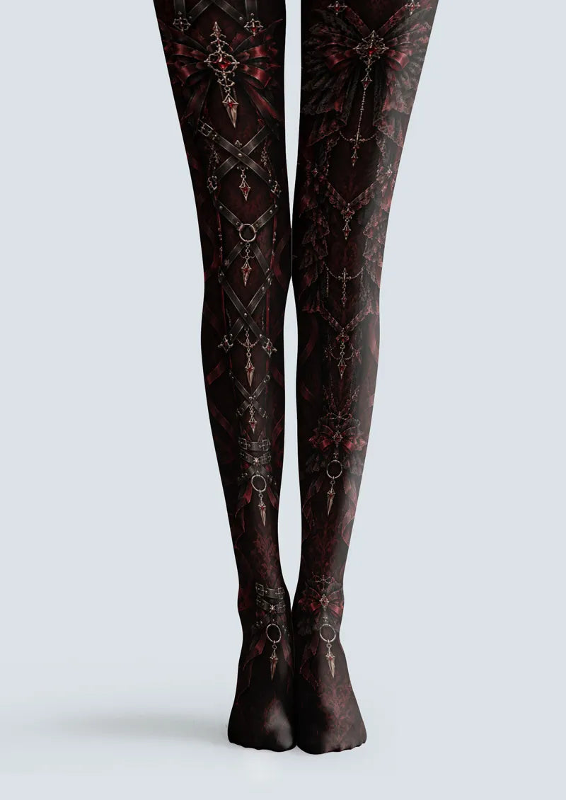 Black burgundy printed tights with gothic ribbon, lace, and jewel motifs