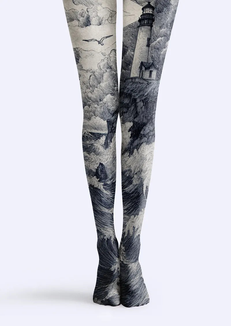 Gray Lighthouse Seascape Tights with navy ocean waves, clouds, and cliff details. Printed tights for dresses, skirts, and everyday or evening styling.