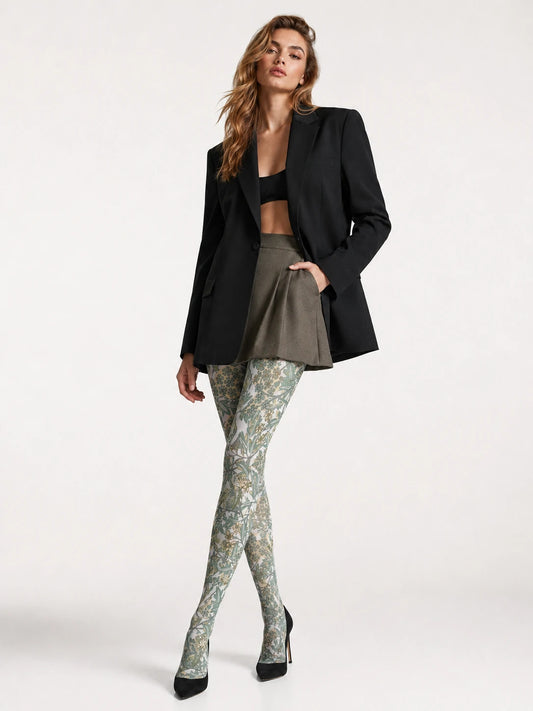 Model wearing Sage Botanical Vine Floral Tights in a styled outfit