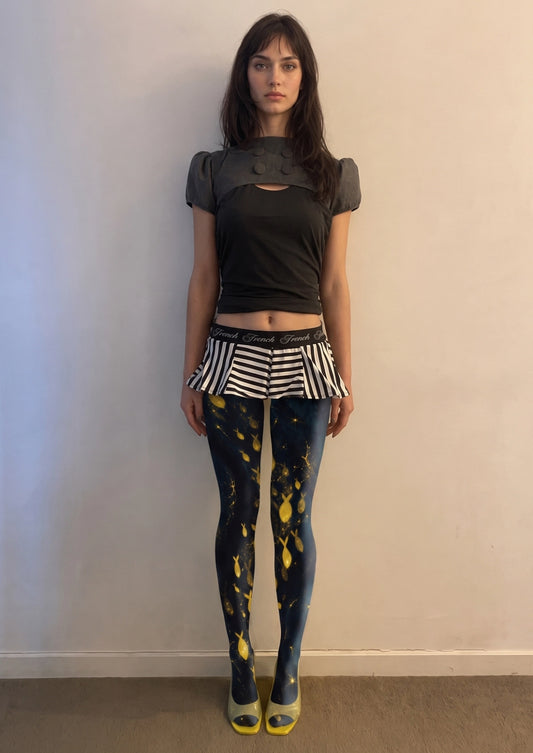 Model wearing Golden Fish Starry Galaxy Tights in a styled outfit