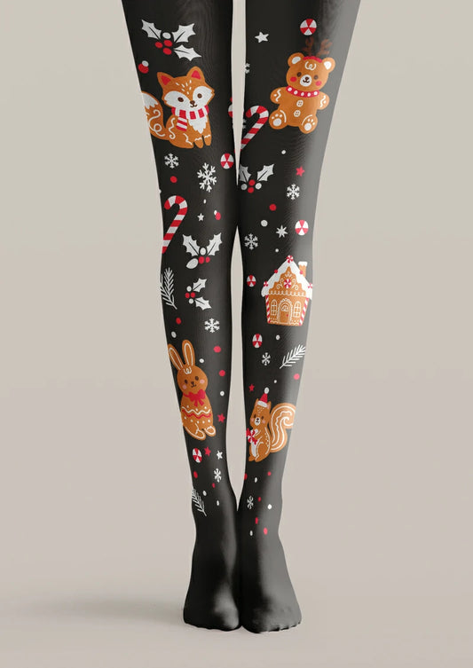 Black printed tights with orange gingerbread-style animals, icing details, candy canes, snowflakes and a gingerbread house.