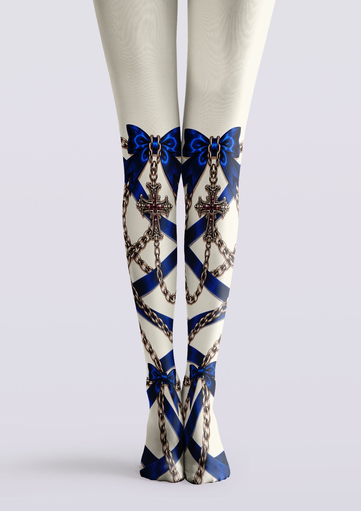 Ivory printed tights with blue bows, diagonal ribbons, bronze-toned chains, and ornate cross pendants on both lower legs.