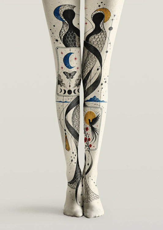 Ivory printed tights with black serpents, blue and yellow moons, tarot-style cards, a butterfly, and a bird