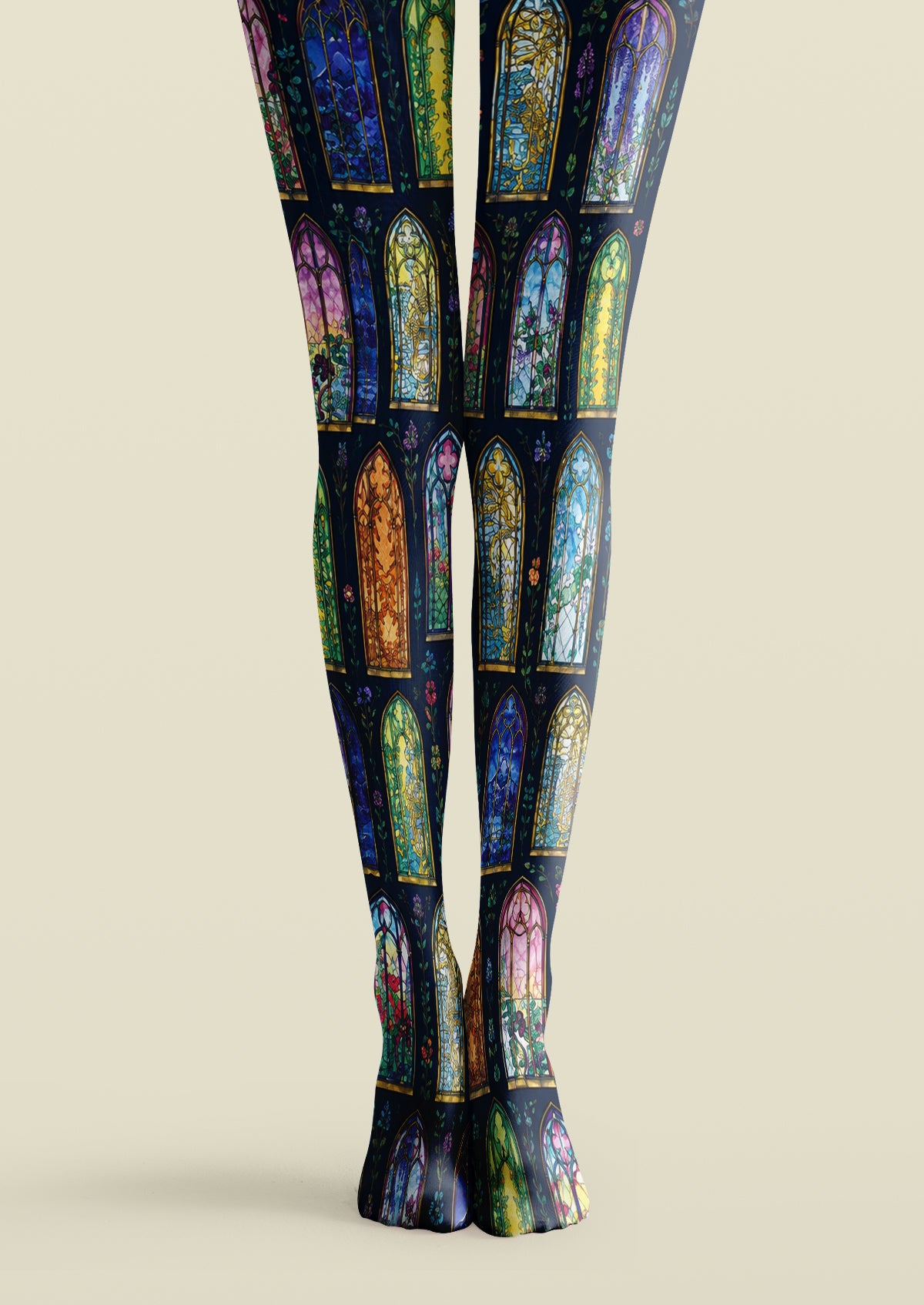 Black printed tights with colorful stained glass window motifs, pointed arches, and small floral details.