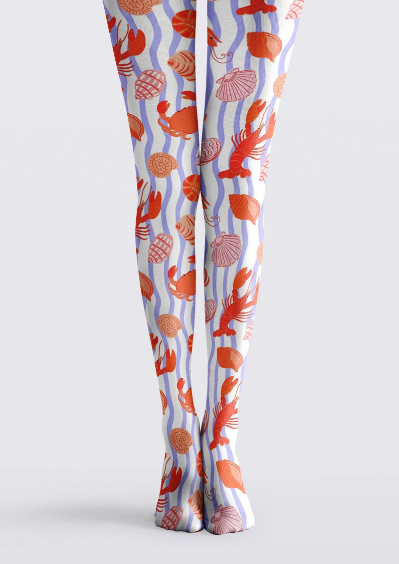 White printed tights with wavy blue stripes and red lobsters, crabs, shells and other sea life