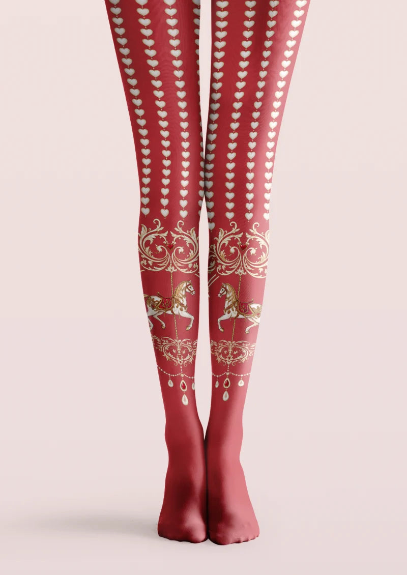 Red printed tights with pale heart rows, carousel horses, ornate scrollwork and jewel-like decorative motifs