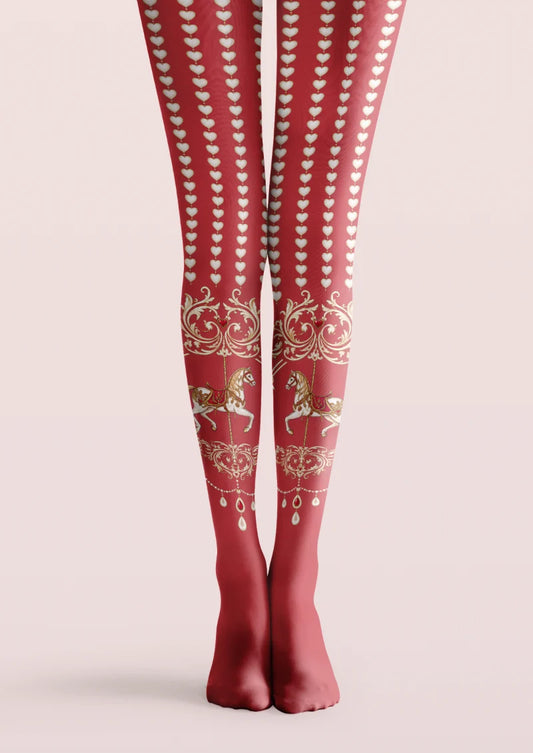 Red printed tights with pale heart rows, carousel horses, ornate scrollwork and jewel-like decorative motifs