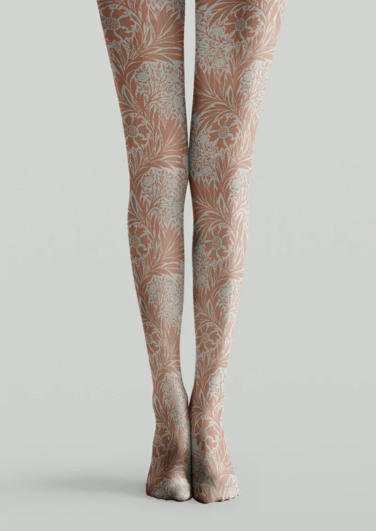 Orange and white printed tights with dense flowers, curling stems, sweeping leaves and dotted flower centers