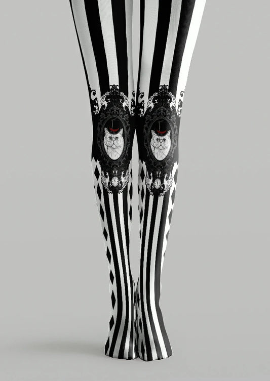 Black and white printed tights with striped panels, ornate cat portraits, clocks, and red hat accents