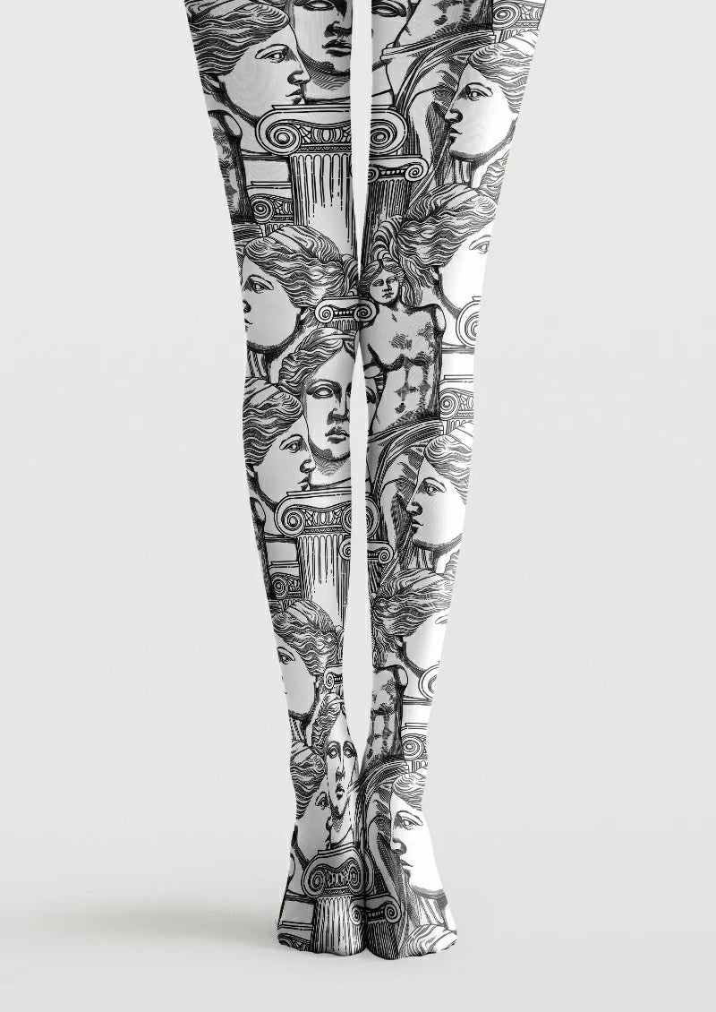 White printed tights with black line drawings of classical-style statue faces, torsos and scroll-topped columns.