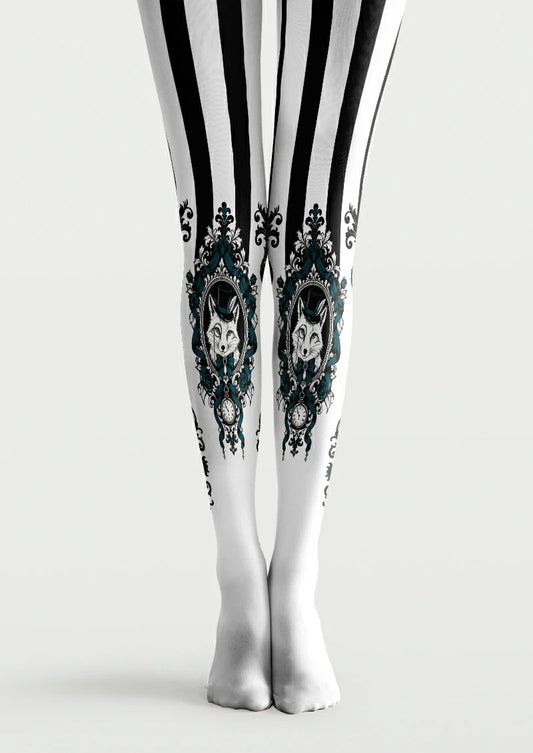 White printed tights with black stripes, blue scrollwork, framed fox portraits, and clocks