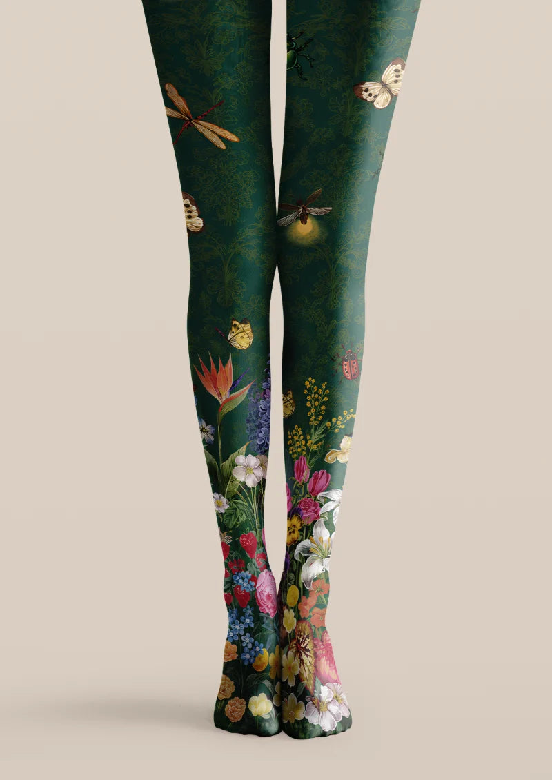 Green printed tights with butterflies, insects, and colorful floral garden motifs