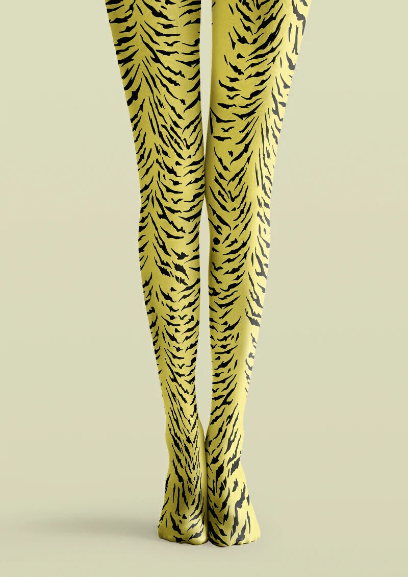 Yellow printed tights with black tiger markings forming irregular curved and branching stripes.