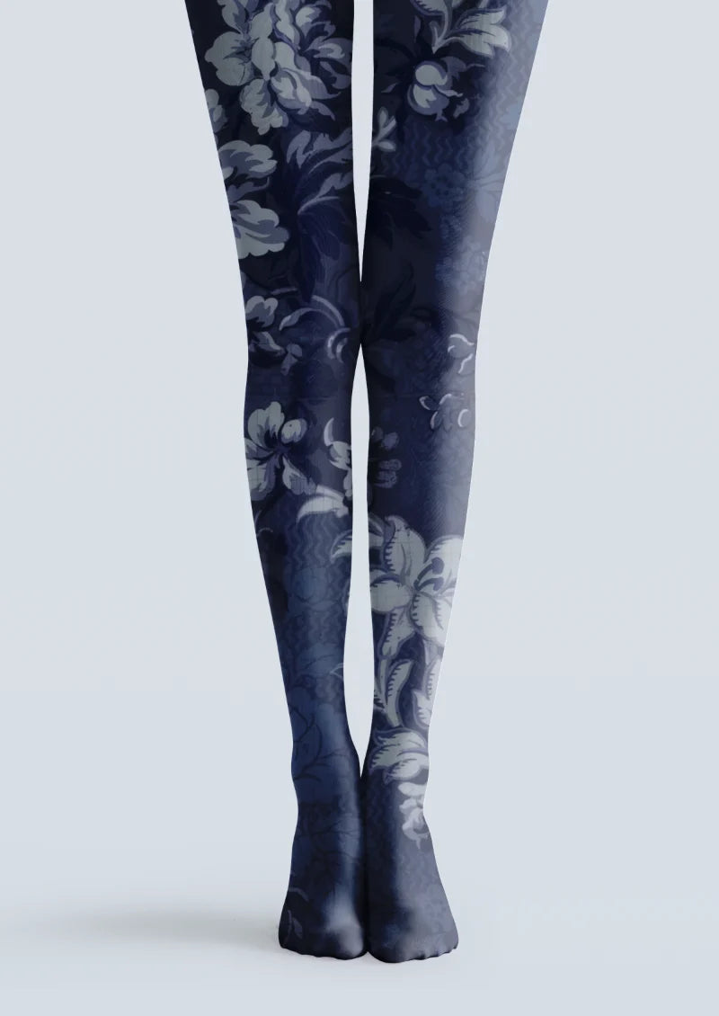 Navy printed tights with oversized blue-gray floral and leafy patterns