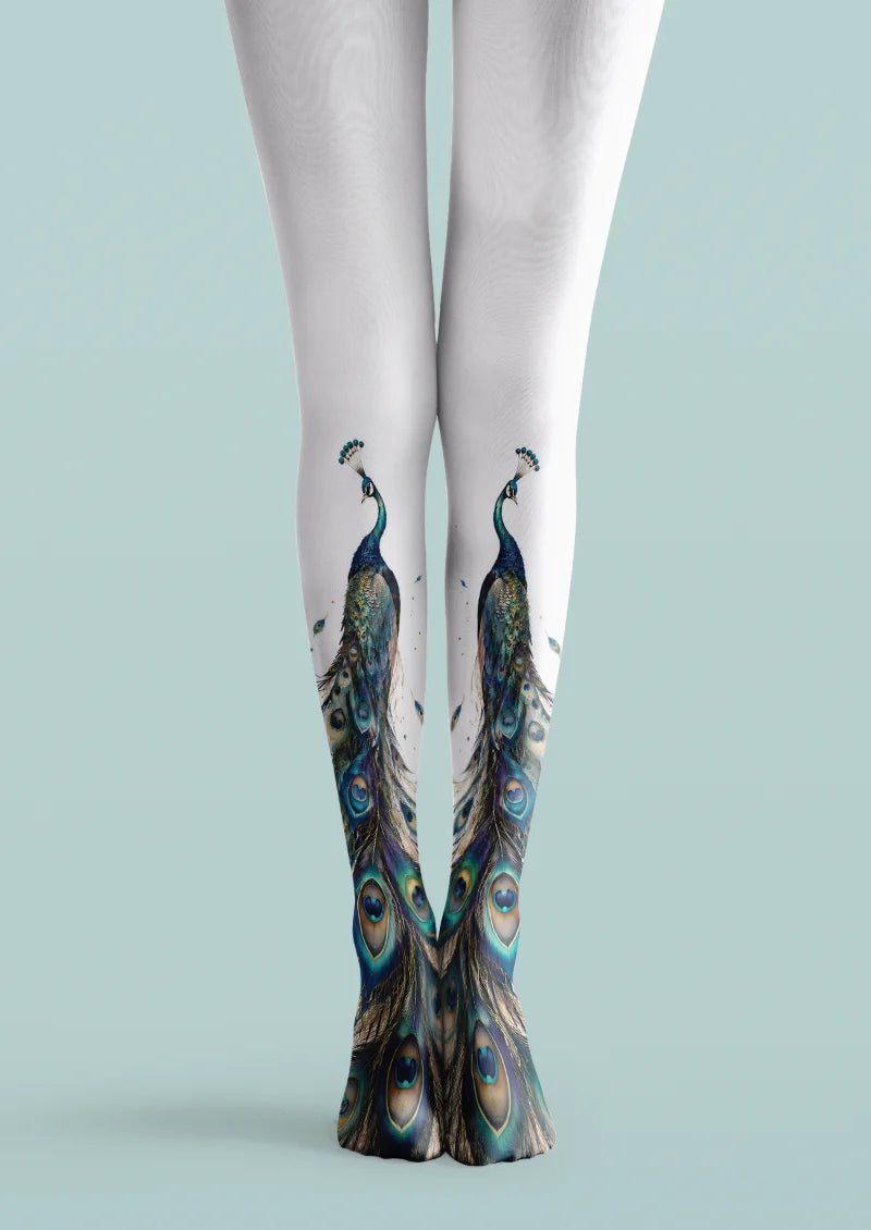 White printed tights with blue and green peacock illustrations and detailed feather-eye motifs