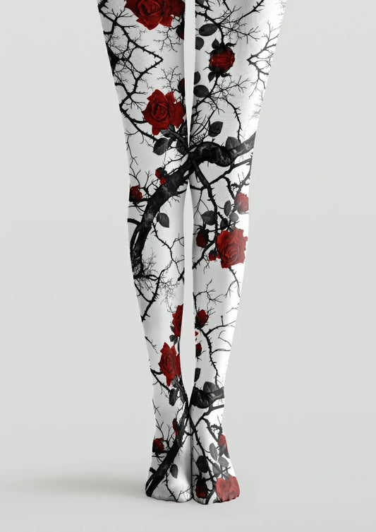 White printed tights with red roses, black thorn branches and dark leaves