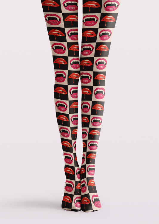Black printed tights with red and pink lip motifs, checkerboard panels, and repeating mouth illustrations.