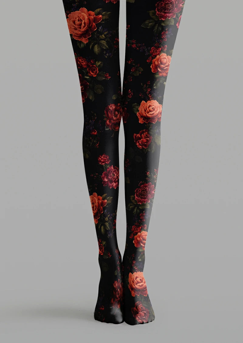Black printed tights with red and orange roses, dark leaves, small blossoms and berry-like floral accents