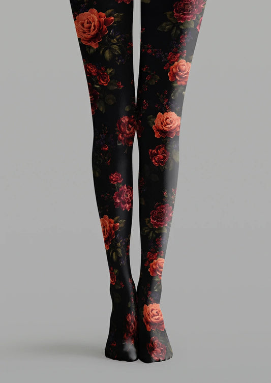 Black printed tights with red and orange roses, dark leaves, small blossoms and berry-like floral accents