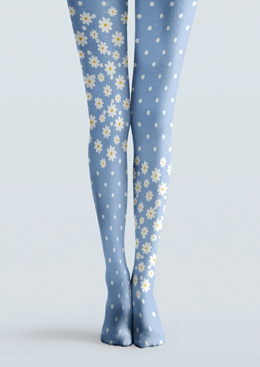 Blue printed tights with white daisy clusters, yellow centers, and evenly spaced polka dots