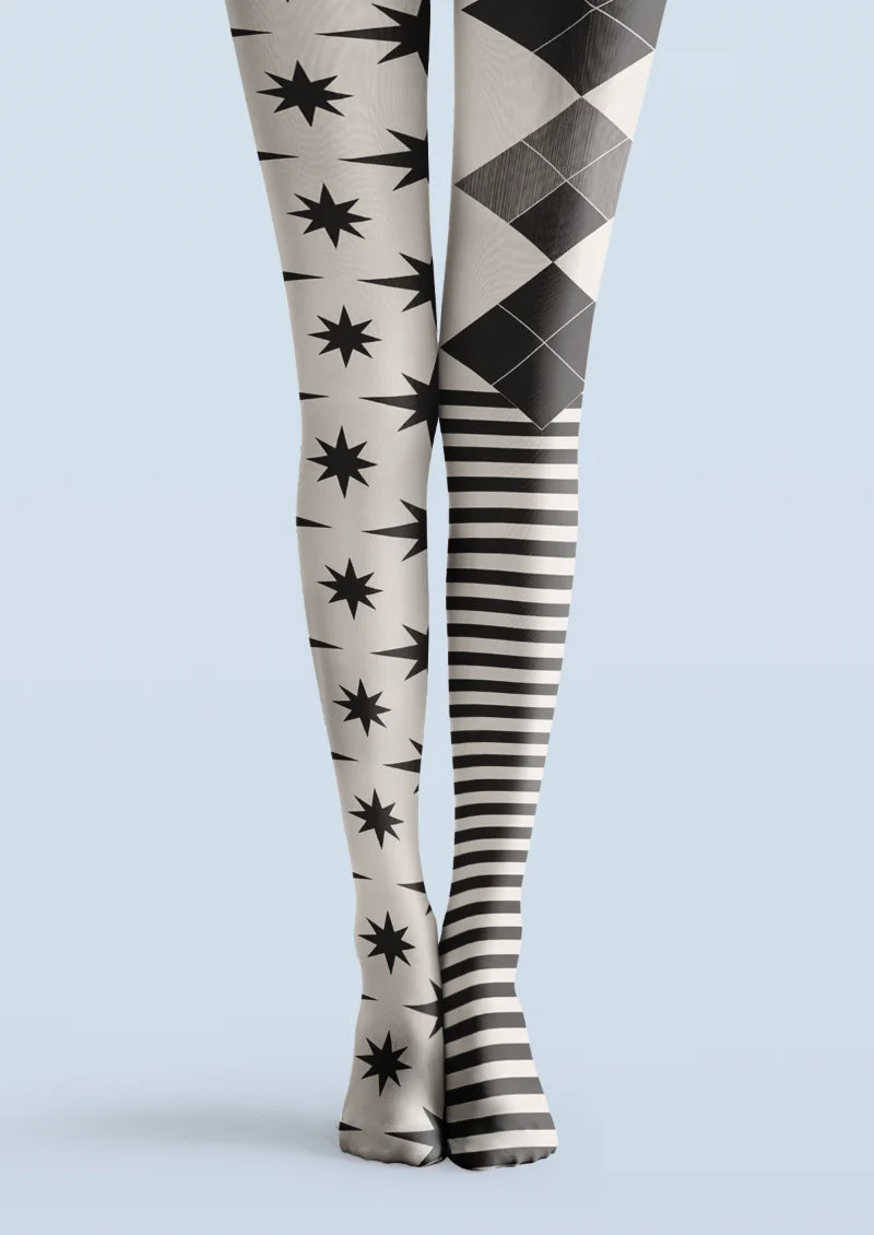 Black, white and gray printed tights with starbursts, diamond graphics and horizontal stripes