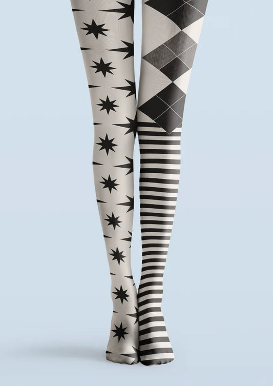 Black, white and gray printed tights with starbursts, diamond graphics and horizontal stripes