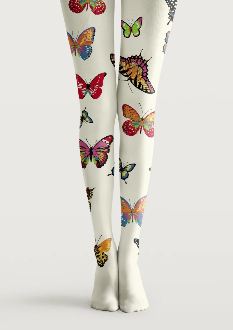 White printed tights with colorful butterflies in varied sizes and detailed wing patterns