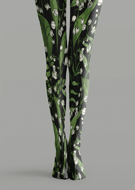 Black printed tights with white bell-shaped flowers, green stems and long leaves