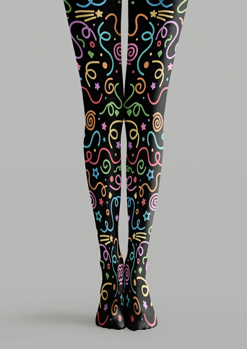 Black printed tights with colourful loops, spirals, stars, dots and small diamonds, including pink and blue details.