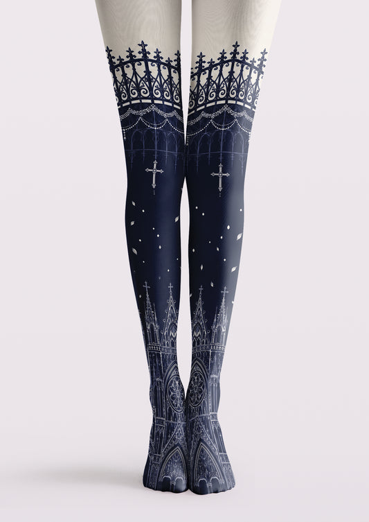 Navy printed tights with gothic arches, cathedral structures, iron gate motifs, crosses, and white architectural details.