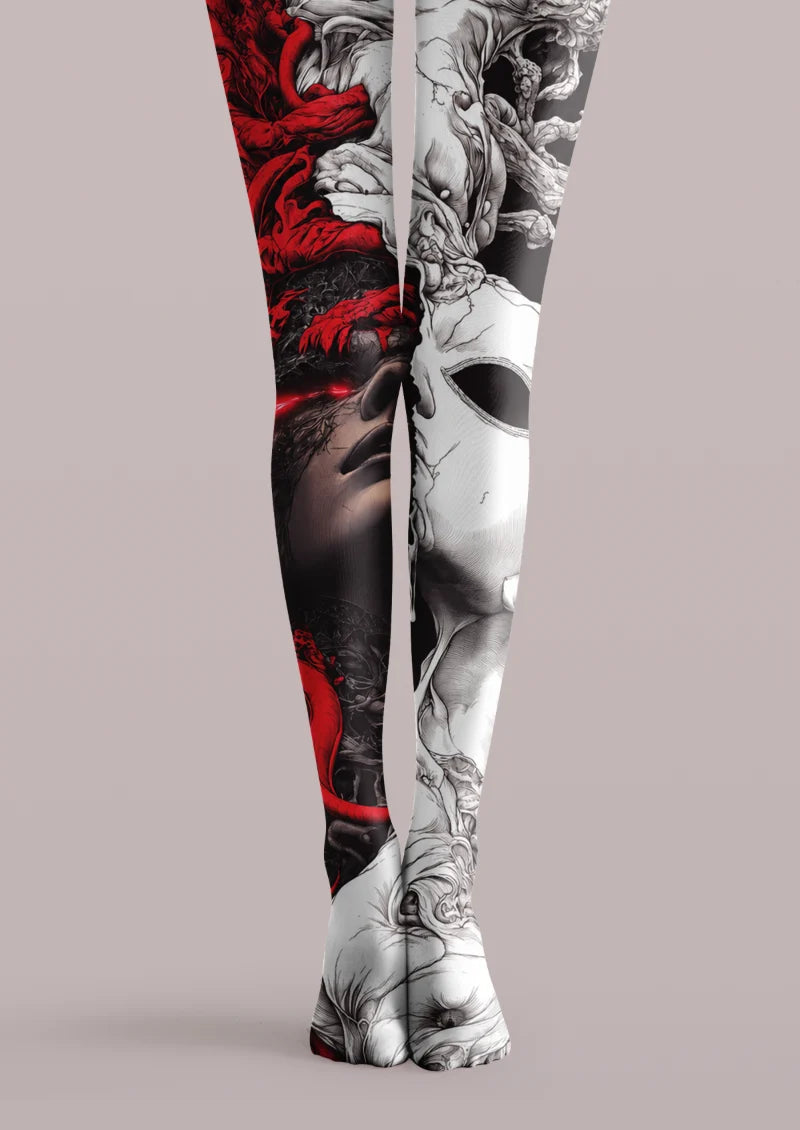 Black, white, and red printed tights with sculptural faces, organic forms, and tattoo-inspired artwork across both legs
