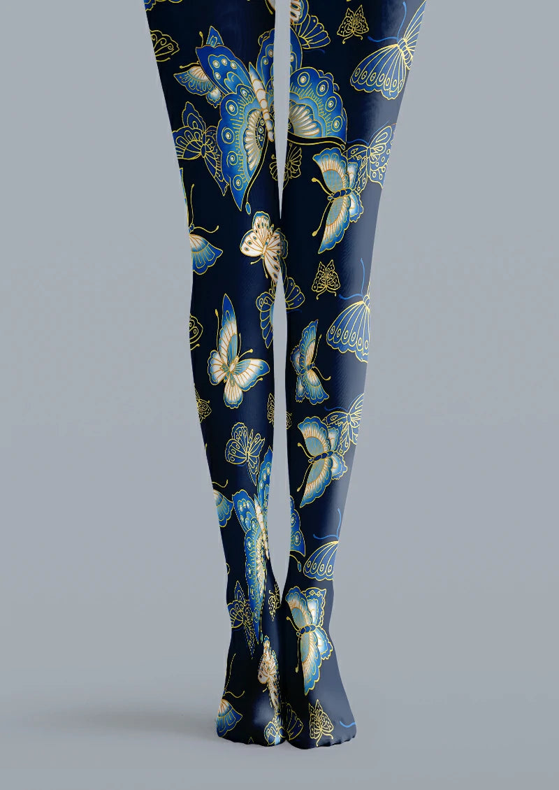 Navy printed tights with butterflies in varying sizes, blue wing details and yellow outlines.