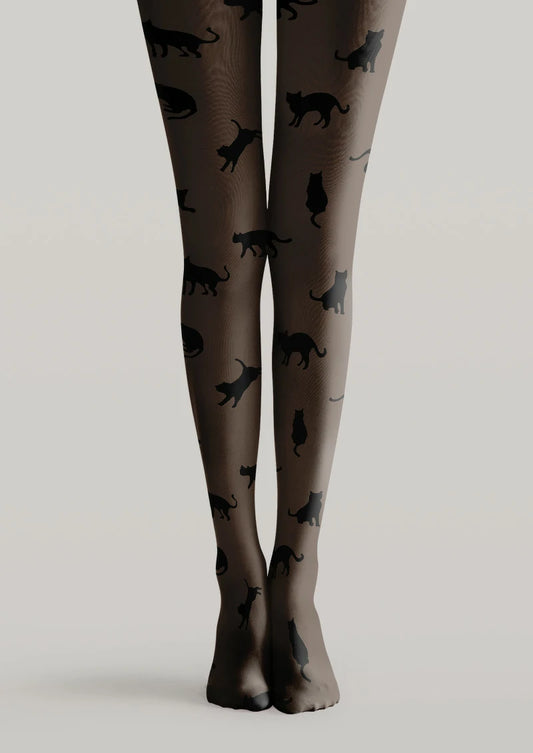 Brown printed tights with scattered black cat silhouettes in varied poses