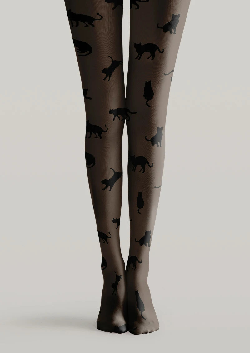 Brown printed tights with scattered black cat silhouettes in varied poses