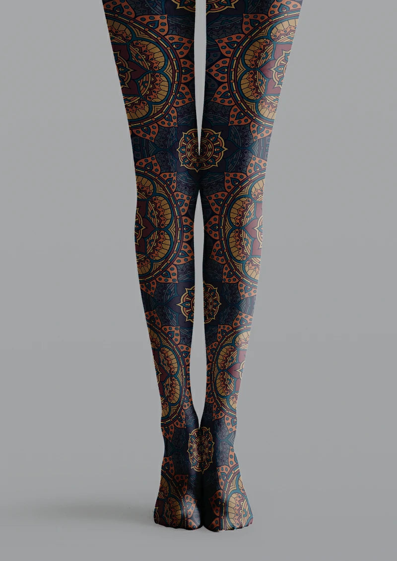 Navy printed tights with orange mandala sections, blue outlines, purple details and repeating circular medallions.