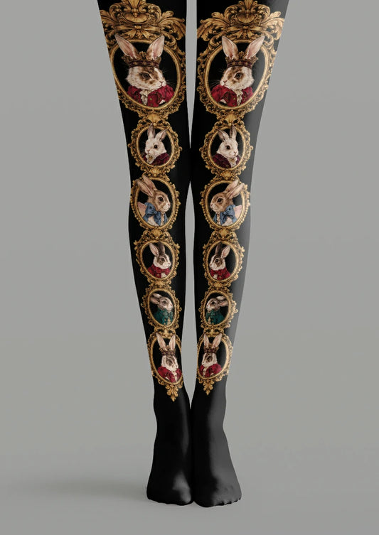 Black printed tights with rows of dressed rabbit portraits in ornate bronze-coloured oval frames, including crowned rabbits.