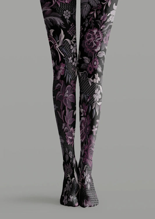 Black printed tights with purple blooms, gray flowers and leaves, printed lattice areas, zigzags and small rectangular grids.