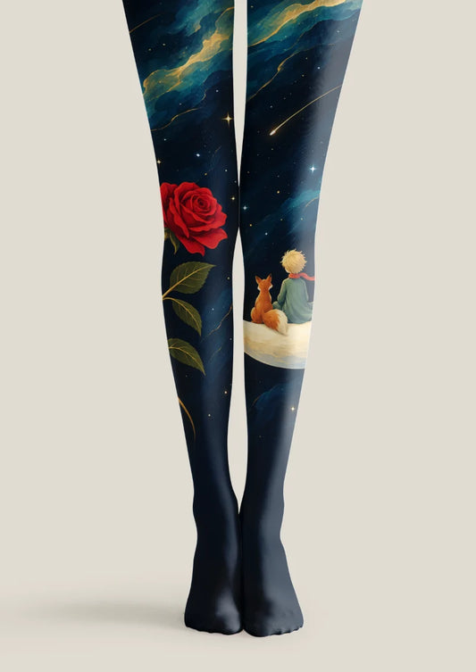 Navy tights with red roses, blue nebulae, stars, and a blond figure beside an orange fox on a pale crescent moon.