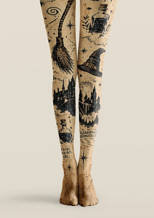Beige printed tights with witch hats, broomsticks, potion bottles and castle silhouettes